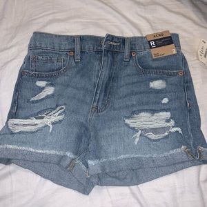 Ripped medium wash Aero mom shorts